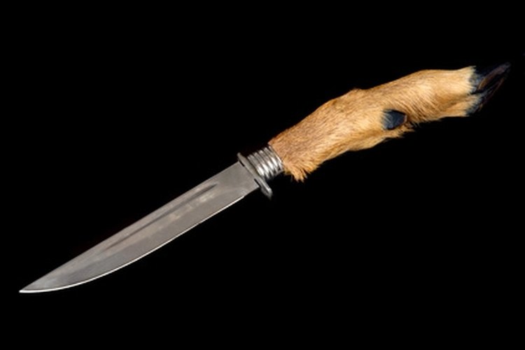 hunting knife image by Alx from Fotolia.com Blackjack knives produce hunting, fighting and workman knives.