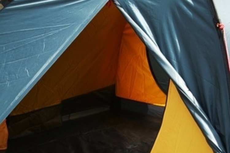 Green tent image by Galyna Andrushko from Fotolia.com KOA campgrounds have various regulations.