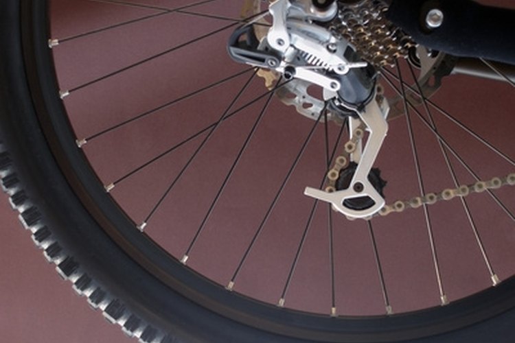 a downhill mountainbike gear wheel and gearshift mechanism image by Stephen Gibson from Fotolia.com The Shimano 200GS STI is a discontinued mountain bike derailleur.