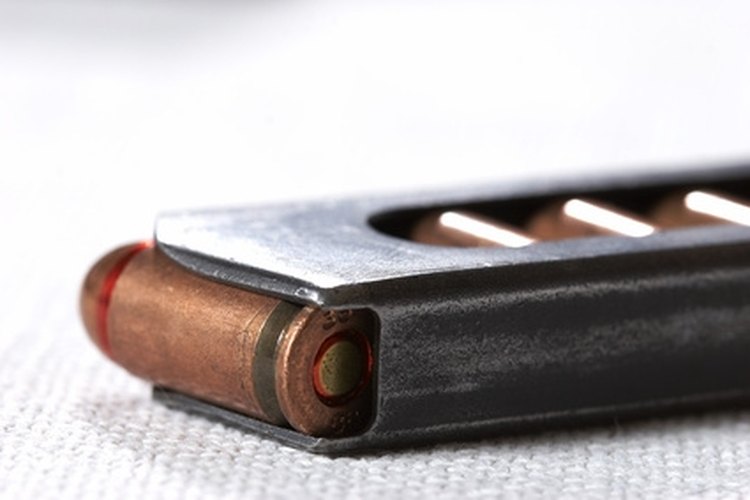 bullet image by AGphotographer from Fotolia.com Some magazines have a capacity of 15 rounds or more.