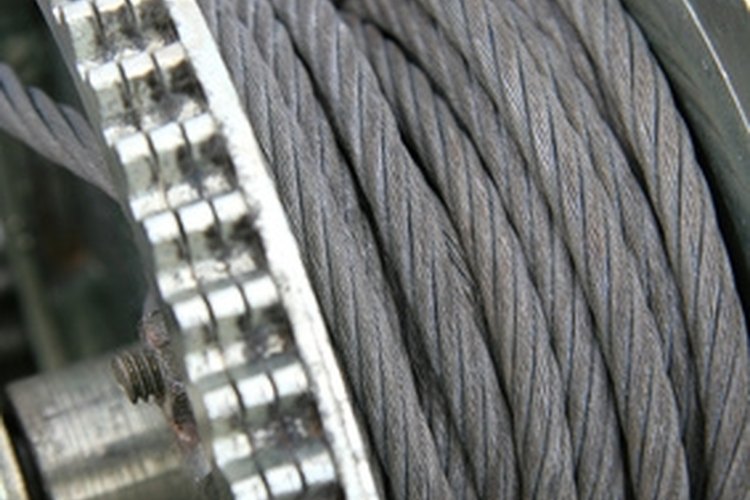 filin de treuil image by Mitch Chanet from Fotolia.com Properly attaching cable to your boat's winch is a process.