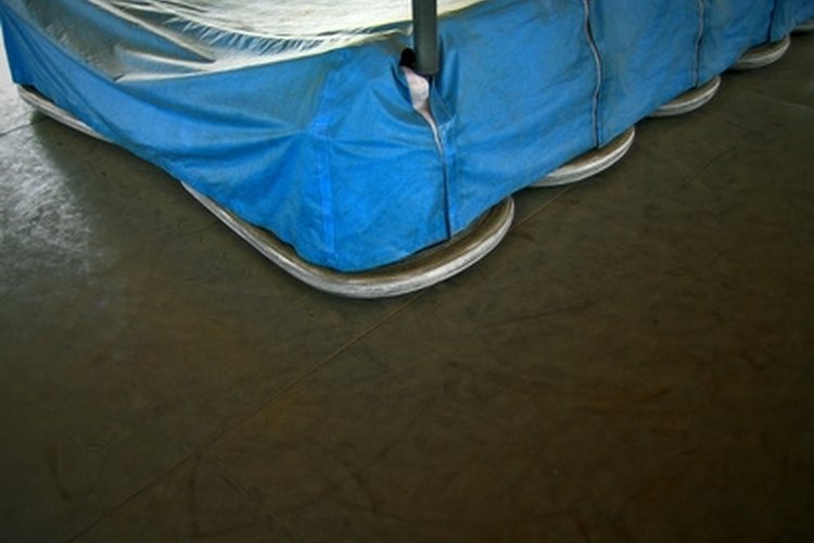 auto-scooters image by Jacques PALUT from Fotolia.com You can fix your torn or damaged tarp instead of throwing it away.