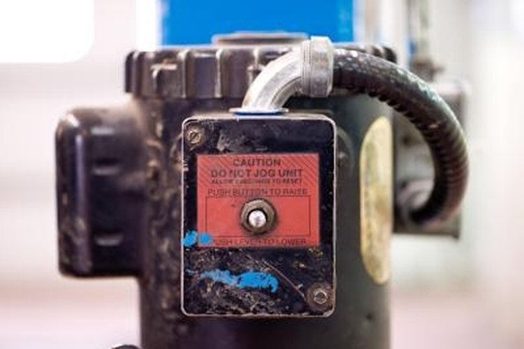 Jupiterimages/Photos.com/Getty Images Identify an Onon generator from the serial number found on the name or faceplate.