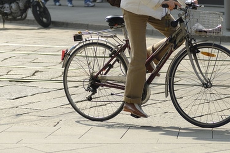 riding bicycle image by apeschi from Fotolia.com Cycling is an effective form of exercise.