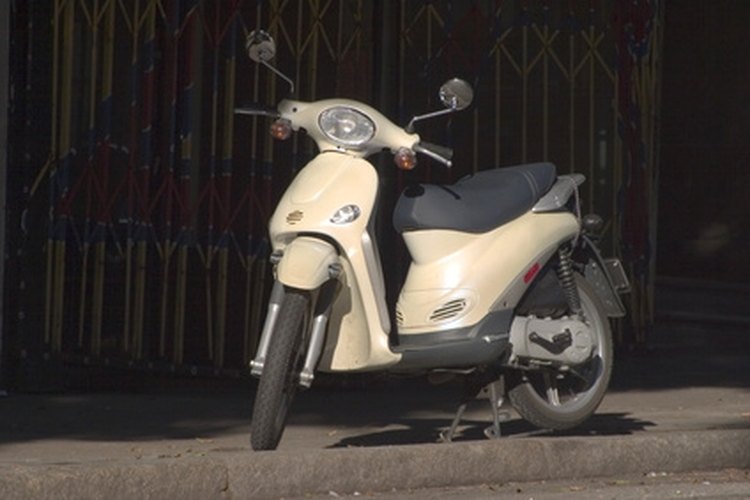 motor scooter #2 image by Aaron Kohr from Fotolia.com Replace your scooter's battery when it no longer holds a charge.