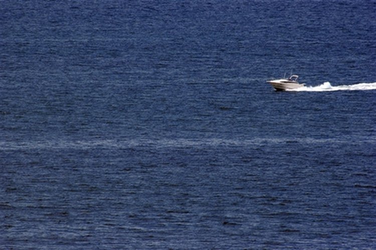 boat image by Byron Moore from Fotolia.com Use the throttle to speed up outside of safe harbor on open water.