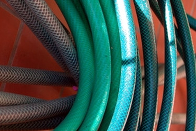 garden serpent image by Adam Borkowski from Fotolia.com Organize your garden hose with a hose reel