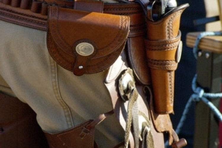 armed 4 image by Jim Parkin from Fotolia.com Leather holsters require a breaking in period.