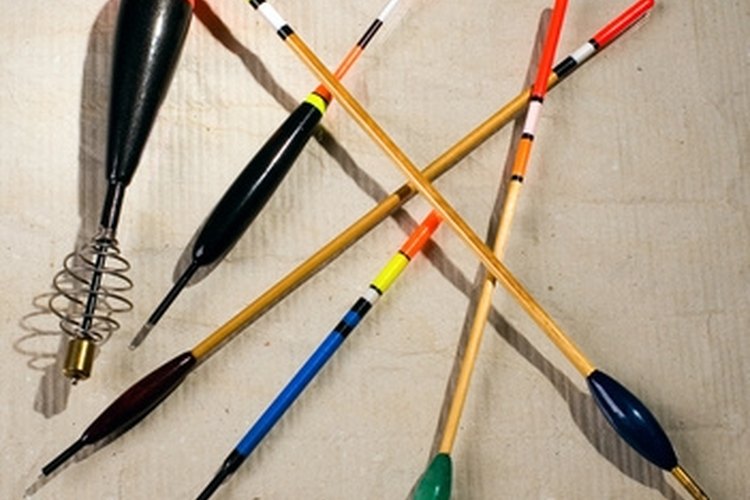 Multi-coloured fishing floats are spread out on a table image by Aliaksandr Zabudzko from Fotolia.com Bobbers and jigs