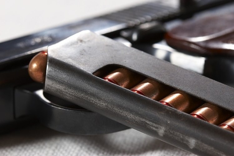 pistol's bullet image by AGphotographer from Fotolia.com Pistol magazine.