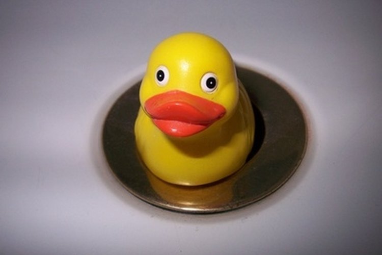 Duck in the bath tub image by phillips4 from Fotolia.com Perform your own RV tub repair to save time and money.