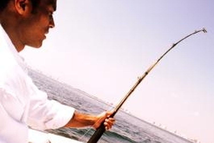 John Foxx/Stockbyte/Getty Images Using a planer board will help you land more fish.