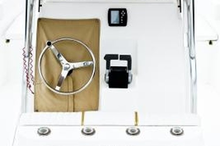 Jupiterimages/Photos.com/Getty Images You should visualize how the boat steers and is powered before attempting any repairs.