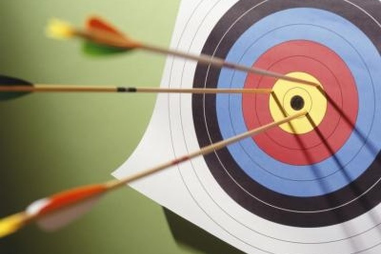 Photodisc/Photodisc/Getty Images Most shooters will require assistance from a mechanical device to cock a crossbow.
