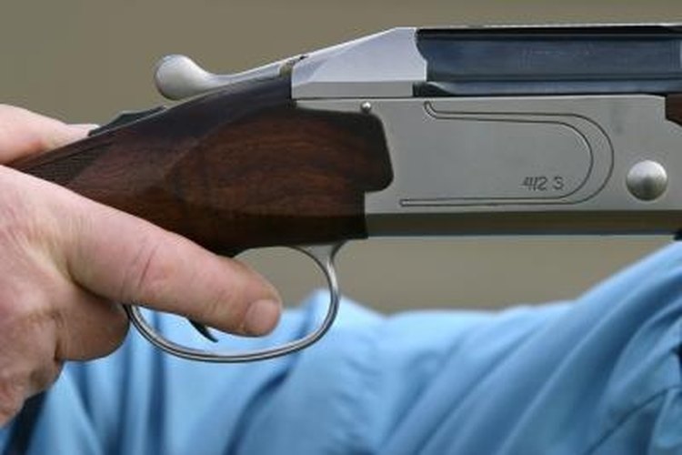 Jupiterimages/Photos.com/Getty Images Adjusting the trigger can improve accuracy in many Crosman air rifles.