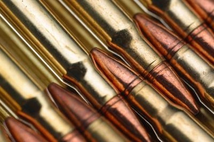 NA/Photos.com/Getty Images Clean the Lever Action of a Rifle
