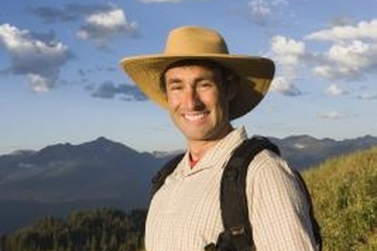 Jupiterimages/Comstock/Getty Images The backpacking tent is designed for tall people.