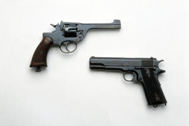 Photos.com/Photos.com/Getty Images The Llama XV looks almost exactly like the Colt 1911 (lower right) except the barrel is smaller.