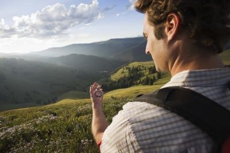 Jupiterimages/Comstock/Getty Images Use a compass to travel safely and accurately.