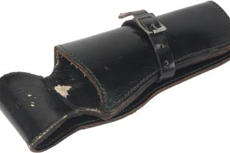 Hemera Technologies/Photos.com/Getty Images Use a standard holster as rough model when designing your own.