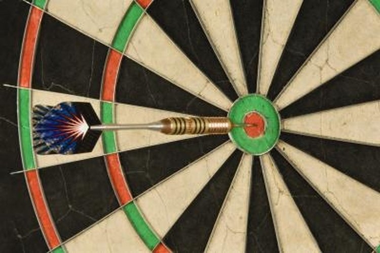 Thinkstock Images/Comstock/Getty Images A ring-barreled dart finds the mark.