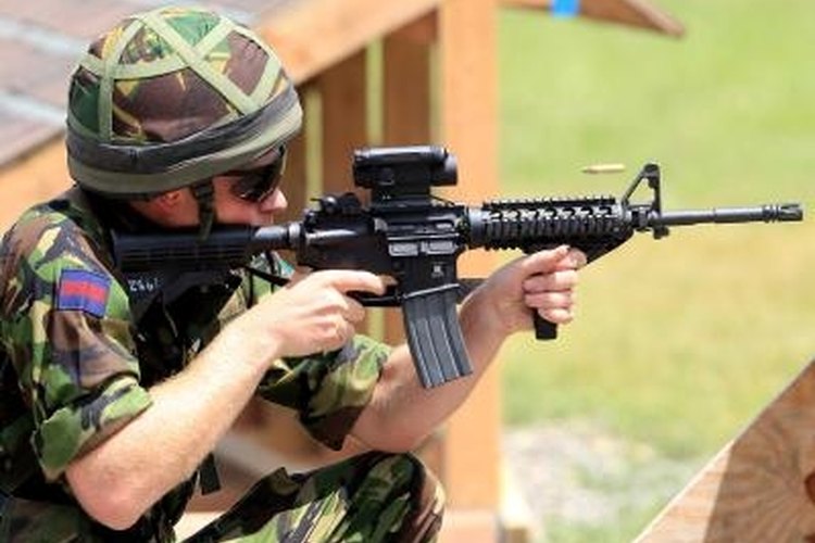 Chris Jackson/Getty Images Entertainment/Getty Images The M4 carbine is sometimes fired from the kneeling position.