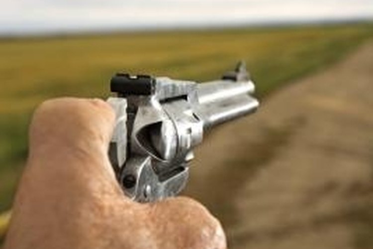 Jupiterimages/Comstock/Getty Images Nickel-plated handguns should be polished often to prevent corrosion.