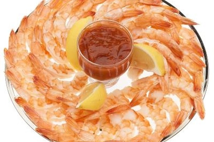 PhotoObjects.net/PhotoObjects.net/Getty Images Catch fresh shrimp along the shoreline to feed guests at your next party.