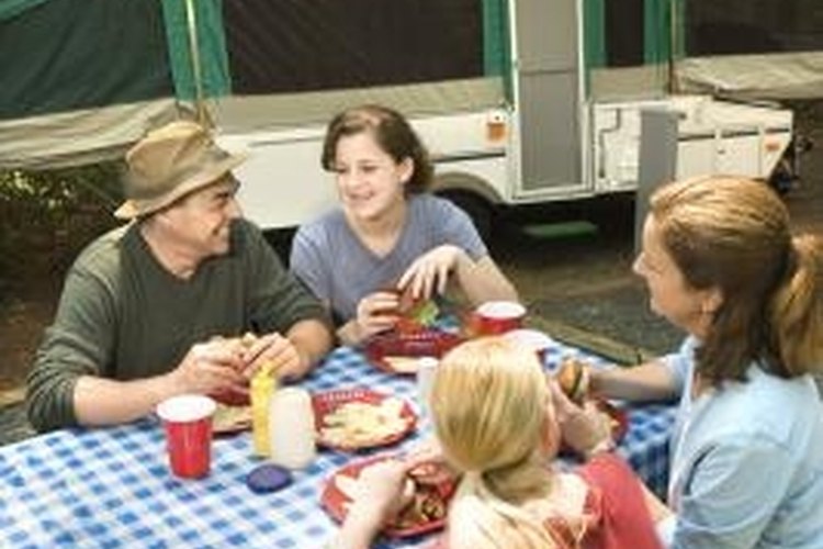 Thinkstock/Comstock/Getty Images The fresh water tank in a pop-up camper provides water for drinking and cooking.