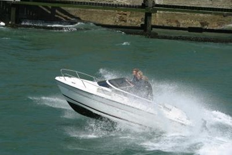 Jupiterimages/Photos.com/Getty Images Trim your speed when piloting through rolling waves