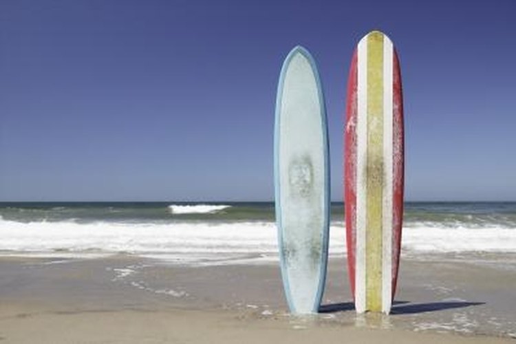 Brand X Pictures/Brand X Pictures/Getty Images Producing your own stand-up paddle board is a challenging exercise.