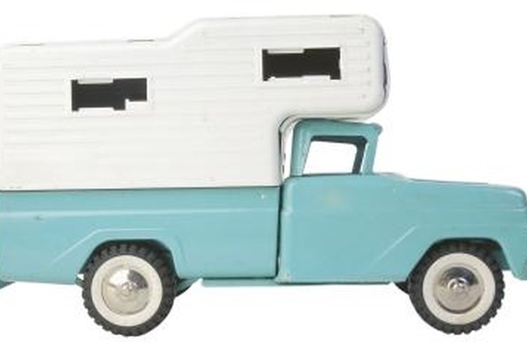 Hemera Technologies/PhotoObjects.net/Getty Images Campers can be adjusted to fit on flatbed trailers.
