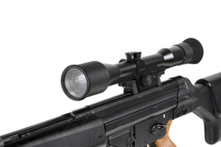 sniper rifle on the tripod and optical sight image by Vladimir Melnik from Fotolia.com For long distance targets, you may need to adjust sights after the first shot.