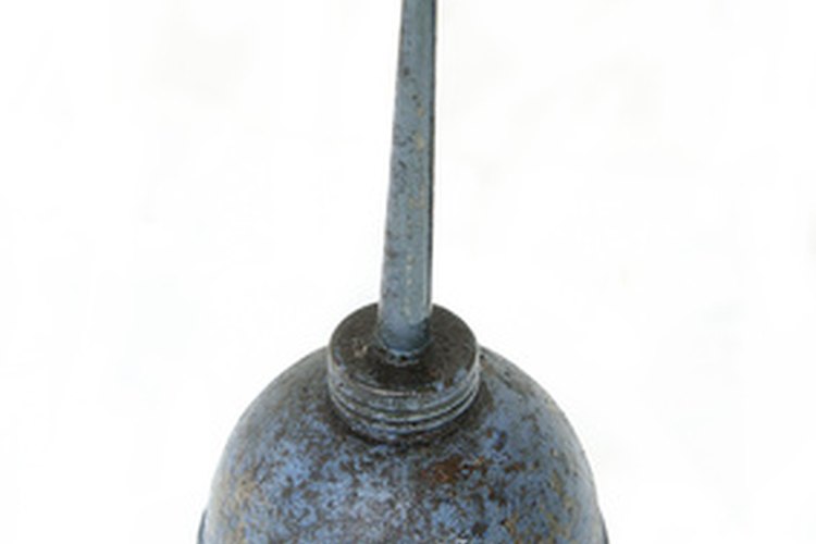 old oil can image by Wayne Abraham from Fotolia.com