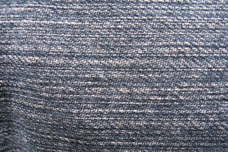 a jeans fabric image by alri from Fotolia.com Duck and denim fabrics are both considered a type of canvas.