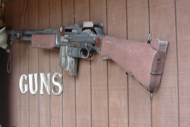 gun sign image by Tammy Mobley from Fotolia.com Some guns are importable only with a federal license.