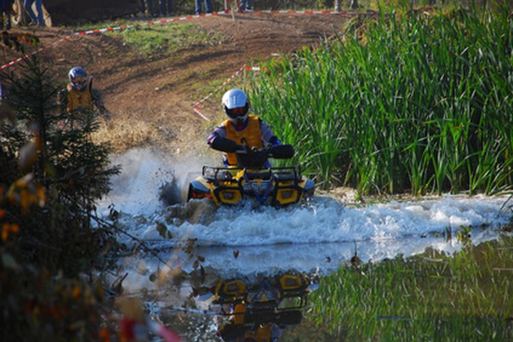 quad4 image by charly_lippert from Fotolia.com ATVs can be used for work or play.