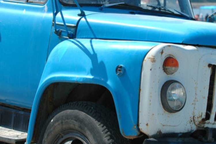 old truck image by Lars Christensen from Fotolia.com Measure your truck size to determine how much space you have.