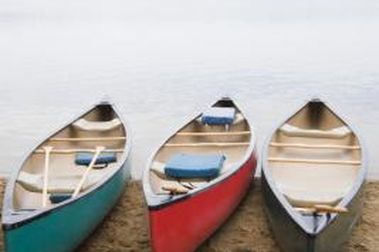 Creatas Images/Creatas/Getty Images Canoes are ideal for touring the outdoors.