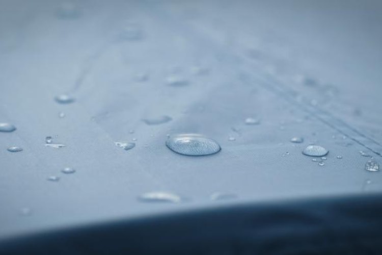 Luchiano/iStock/Getty Images Waterproofing agents cause water to bead up and roll off the treated surface.