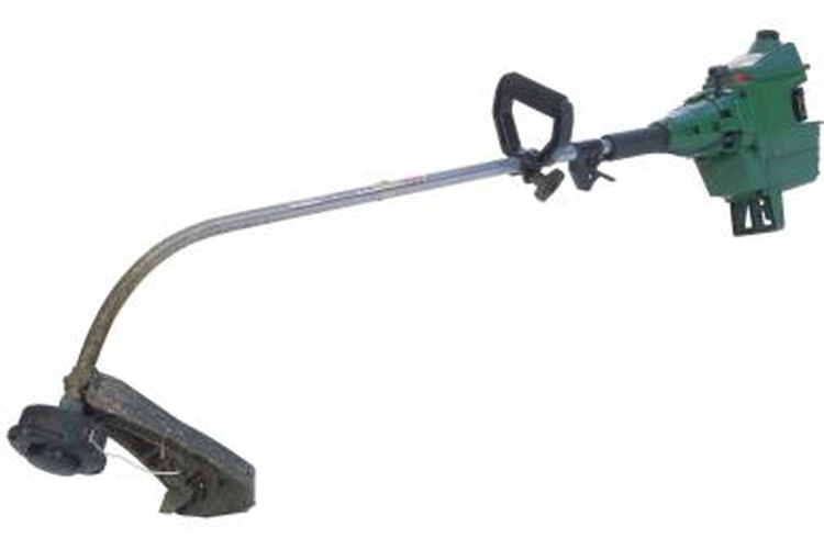 Comstock/Comstock/Getty Images You can convert a weed trimmer into an outboard motor.