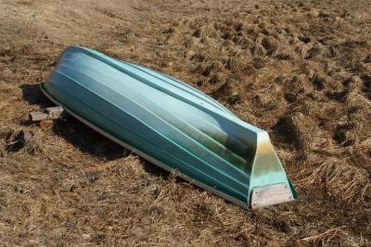 Jupiterimages/Photos.com/Getty Images Constant beaching can damage the hull of a boat.