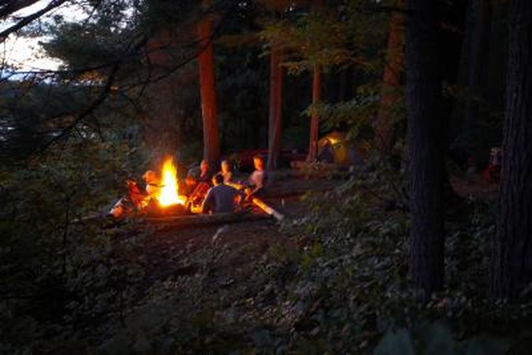 Jupiterimages/Photos.com/Getty Images Campfire programs encourage camaraderie and fellowship.