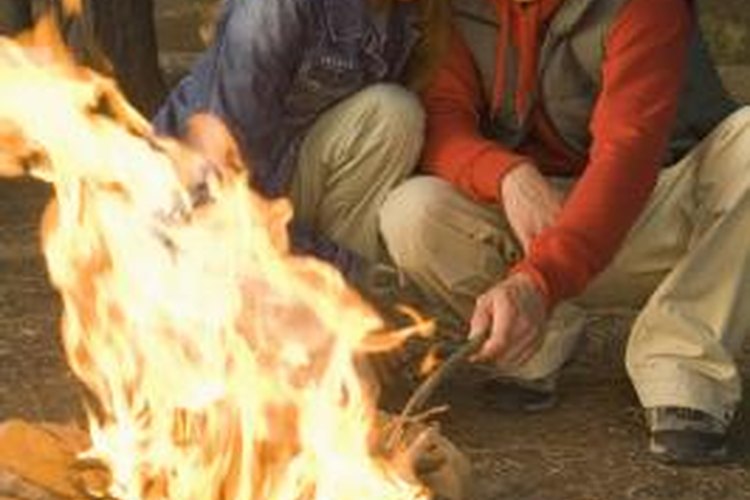 Jupiterimages/Pixland/Getty Images Cozy up to the campfire for romantic play.