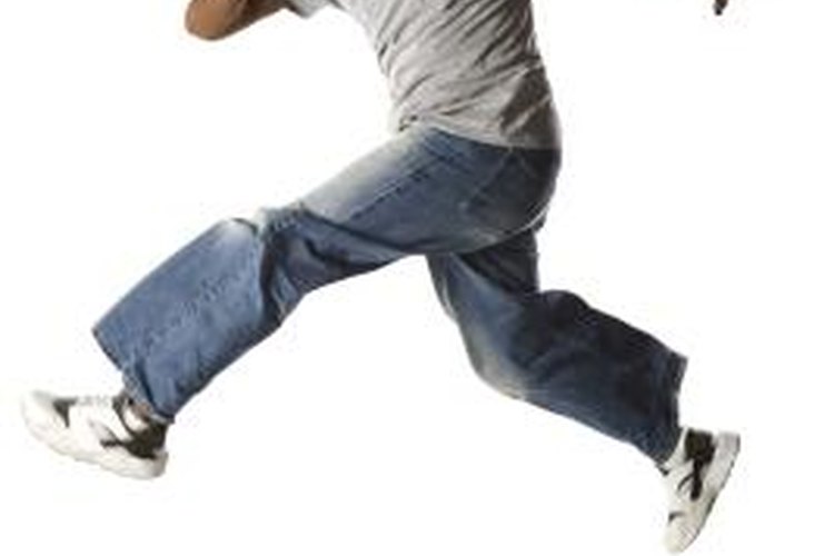 Jupiterimages/Comstock/Getty Images Loose-fitting clothes are best for a hip-hop class.