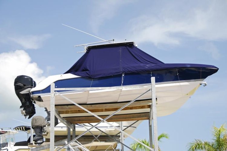 Melissa Madia/iStock/Getty Images A boat covered for protection.