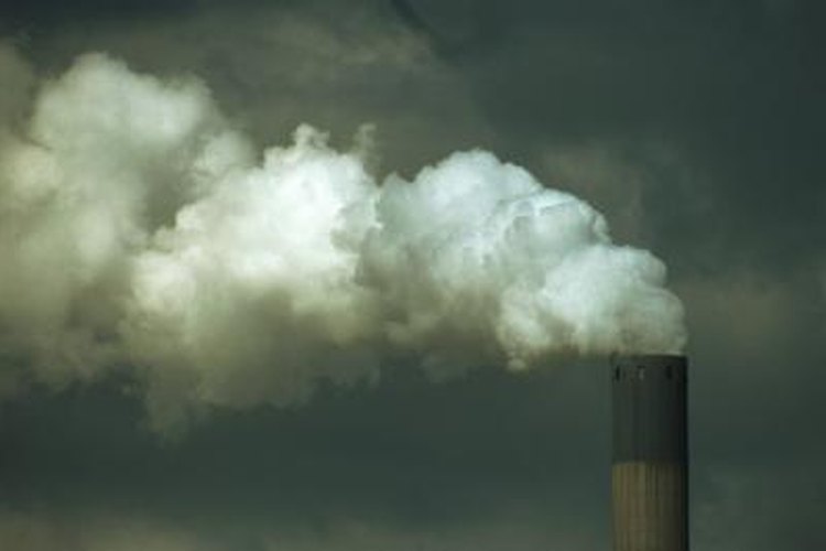 John Foxx/Stockbyte/Getty Images White smoke from an outboard may not mean "the end."