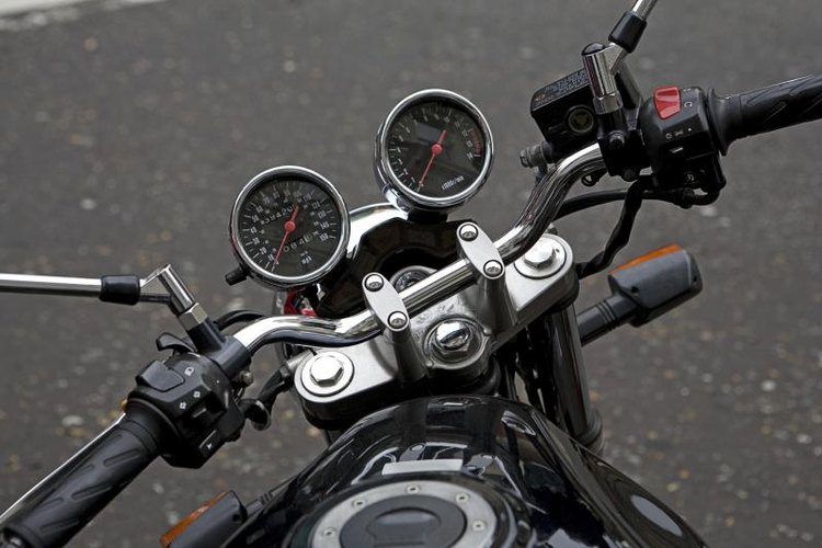 Lucy Claxton/Dorling Kindersley RF/Getty Images Wear comfortable motorcycle gloves.