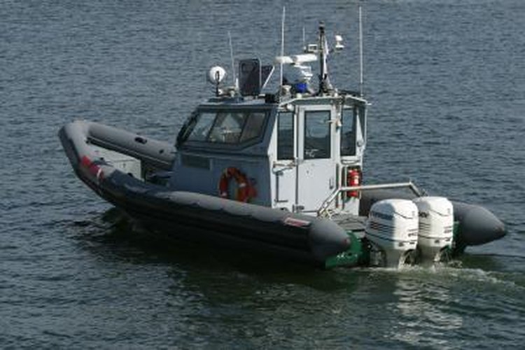 Jupiterimages/Photos.com/Getty Images 2-cycle fuel used in boat motors easily can clog a carburetor float valve.