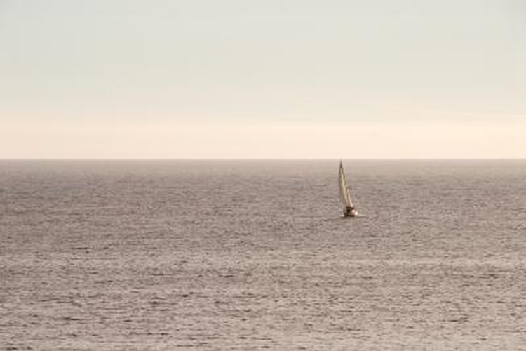 Jupiterimages/Photos.com/Getty Images Any boat can be converted to sail power, but few will sail well.